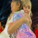 Taylor Swift trots up to a young fan belting out her song lyrics