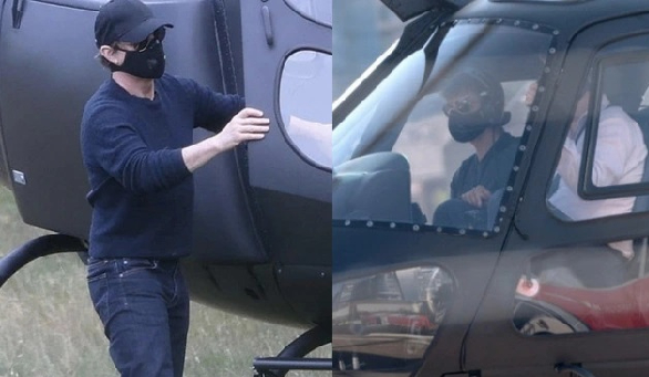 Tom Cruise rushes out of London in helicopter